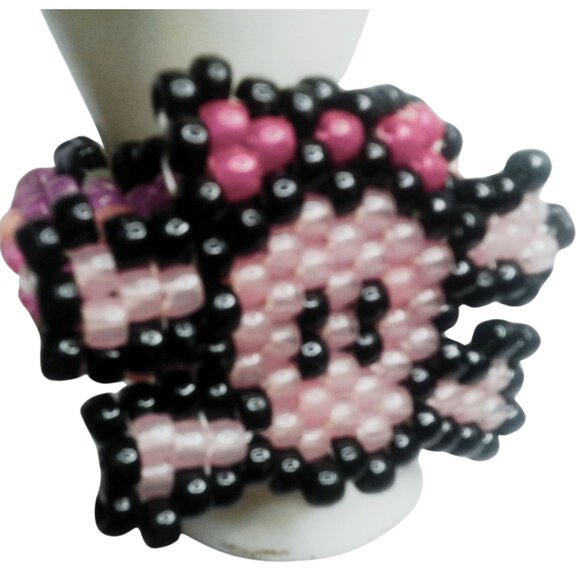 Glow-n-Dark Pink Large skull  On a Glow Kandi Cuff EDM Stretchy Bracelet - Picture 2 of 5